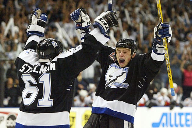 Game 7 hero Ruslan Fedotenko (right) exulted after scoring the second of his two goals.